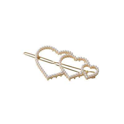 China Korean Hot Selling Handmade High Quality Environmentally Friendly Pearl Hairpins Metal Heart Star Hair Clips Geometric Pearl Circle Gold Clips Accessories for sale