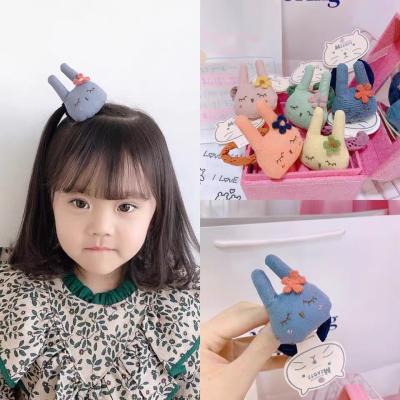 China Environmental friendly factory direct cute rabbit kids hair tie cartoon fabric padded cotton hair rope for kids hair accessories for sale