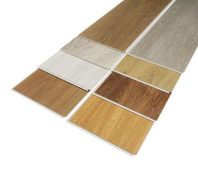 China Raincoat ; Hot Sale Fireproof Spc /Pvc Flooring Vinyl Click Plank Flooring Pisos Rigid Core Waterproof Spc Laminate Flooring for sale