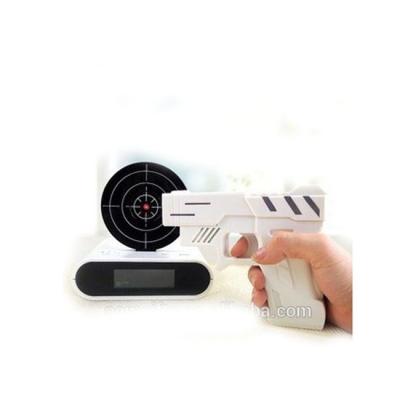 China Funny Novelty Radio Instrument LCD Laser Gun Alarm Clock for sale