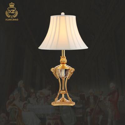 China EUROPEAN XingZhong Metal Holders Table Lamp Sculpture Decoration French Royal Luxury Copper Table Lamp for sale