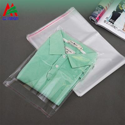 China Transparent OPP Garment Bag T-shirt Plastic Packaging Recyclable Adhesive Sealing Bags for sale