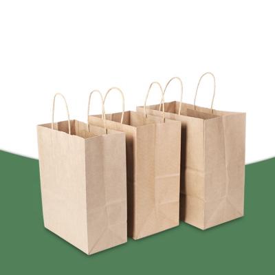 China Disposable Paper Packaging Bag Custom Takeaway Container Bag Cheap Shopping Bag for sale