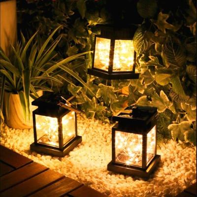 China Garden Lantern Solar Hanging Light LED Candle Flame Effect Waterproof Waterproof Decorative Light for Garden Patio Lawn Tent Yard Platform for sale