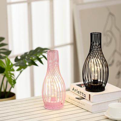 China Modern Retro Wrought Iron Art Led Table Lamp For Bedroom Decoration for sale