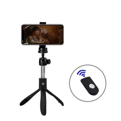 China New Product 360 Rotation Digital Camera Tripod Selfie Stick With Wireless Remote Shutter for sale