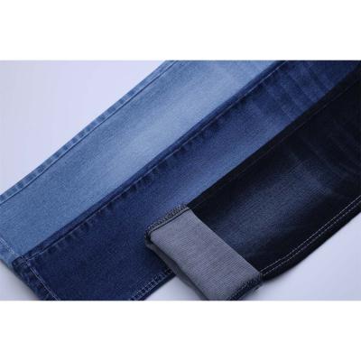 China Shrink-Resistant Made In China Low Price High Poly Cotton Spandex Indigo Blue Jeans Fabric Roll 11oz Good Quality Stretch for sale