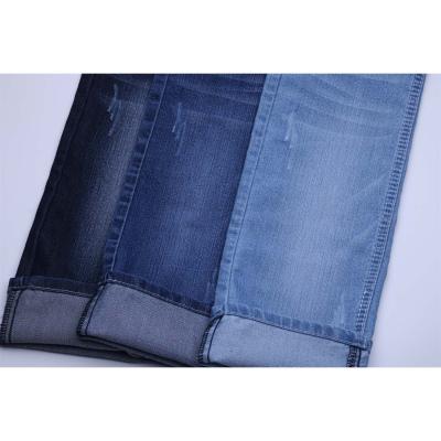 China Shrink-resistant twill whole roving elastic stretch stretch denim fabric price chain wide branded 70C 28P 2SP 9.3oz lycra jeans material for sale