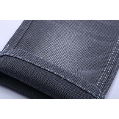 China Cheap Special Black Fashion Colored Backside Fabric Rigid Denim Shrink-Resistant 11.5oz New Price Poly Texture Cotton Denim for sale