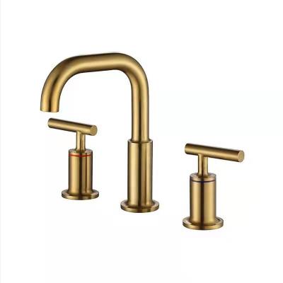 China Metered Faucets 304 Stainless Steel Basin Faucet 3 Hole Deck Mounted Gold Black Brushed Lavatory Faucet for sale