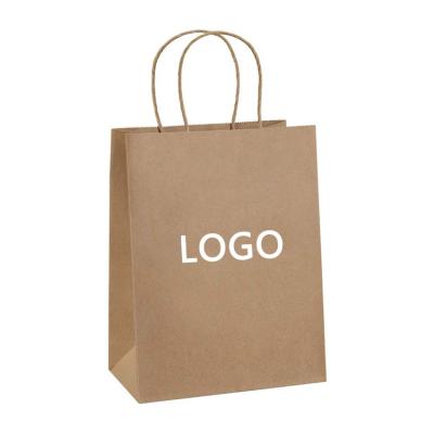 China Disposable Custom Logo Kraft Paper Gift Packaging Bag Wedding Candy Favor Bag With Handle for sale