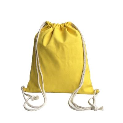 China Wholesale Yellow Canvas Drawstring Handle Cotton Backpack Students Simple Drawstring Bag for sale