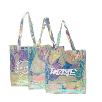 China Transparent Luxury Clear Handled PVC Recycle Packaging Custom Shopping Bags Waterproof Plastic Colored Laser PVC Shopping Bag for sale