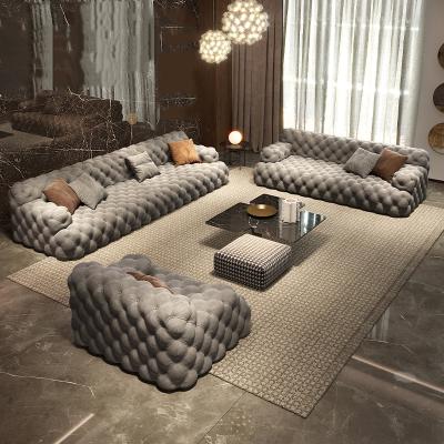 China Hot Sale Adjustable Modern Velvet Sofa Set Furniture Chesterfield (Others) U Shaped Living Room Sectional Sofas for sale