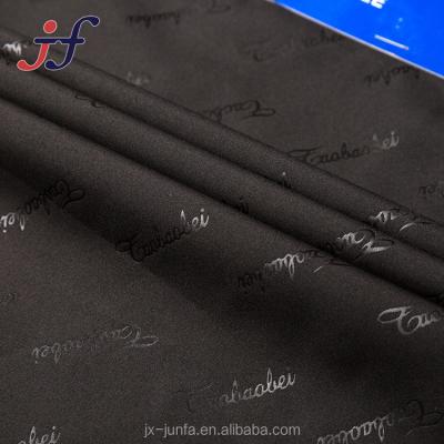 China Wholesale Antistatic 240T 100% Polyester Embossed Plain Pongee Garment Fabric for sale