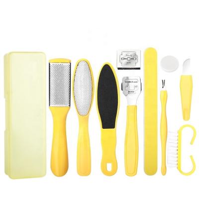 China Deluxe 10 in 1 Yellow Pedicure Set Scraper Knife Feet Size Foot Skin Care Tool Grooming Kit Travel Pedicure Callus Remover for sale