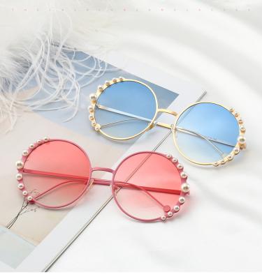 China 2022 fashion sunglasses shape retro round sunglasses metal frame fashion women to bead sunglasses for sale