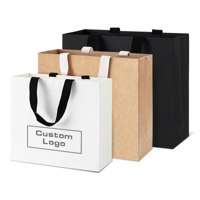 China Custom Free Sample Kraft Paper Bag Waterproof Underwear Garment Clothing Shopping Recyclable Shopping Paper Bag With Handles for sale