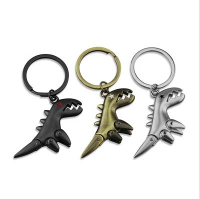 China Personality Vintage Metal Head Chain Pendant Custom Logo New Environmental Mini Metal Dinosaur 3D Model for sale