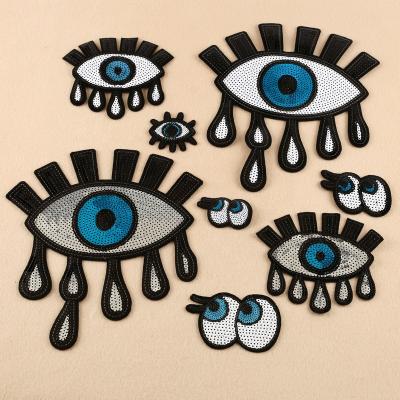 China Viable Wholesale Embroidery And Stage Apparel Sequin Patch Large Sequin Patch Fashion Eye Shape T-shirt Sequin Patches for sale