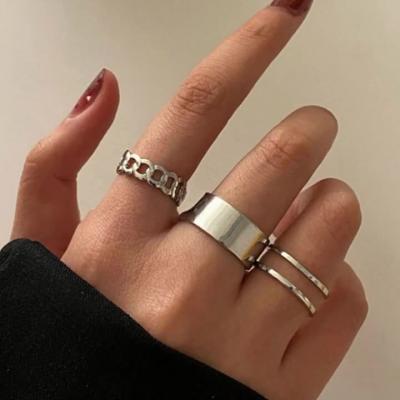 China Environmental Friendly Custom 7 Piece Set Simple Geometric Wave Spring Rings Women Gold Plated Ring Set Of Ring for sale