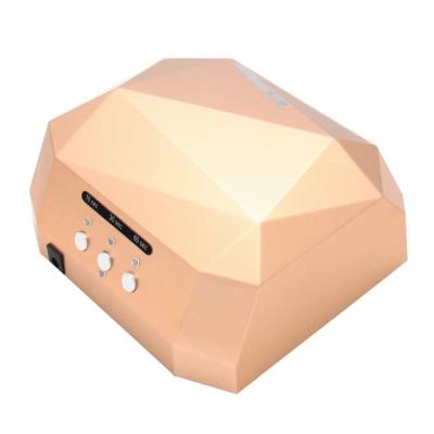 China Hot sale 36w diamond nail sensor led lamp 12w ccfl +24w led with magnet metal bottom led nail dryer for sale