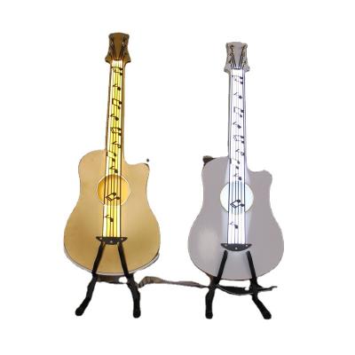 China 2022 New Durable Props Iron Wedding Guitar Ornaments Lighting Road Lead Wedding Stage Layout Cello Ornaments for sale