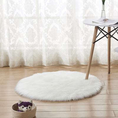 China Anti-Slip Round Shape Wholesale White Pink Sheepskin Faux Fur Blanket Faux Rugs for sale