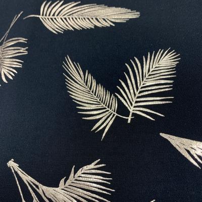 China Beautiful Stretch Memory Textile China Black Gold Feather Printed Span Knitted Fabrics ity For Clothes for sale