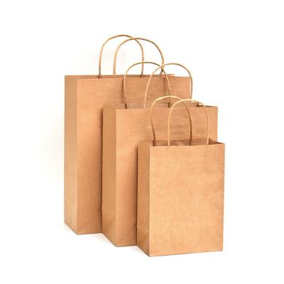 China Wholesale Disposable Customized Paper Bag With You Own Logo Kraft Paper Package Paper Bag for sale