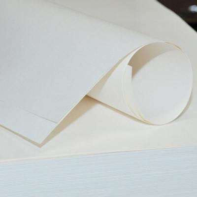 China Wholesale Biodegradable Virgin Kraft Paper Bleached White Bamboo Pulp Kraft Paper Wrapping Paper Packaging for sale