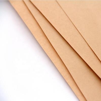 China Biodegradable Virgin Biodegradable Pulp Kraft Paper 40-350 Gsm Kraft Paper Bamboo Brown Roll For Wrapping And Cement Bag for sale