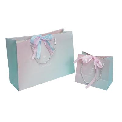 China Hot Selling Mini Luxury Paper Bag Fancy Cheap Wedding Gift Bag Recyclable With Ribbon Bow Packaging Bag for sale