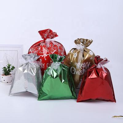 China Colorful And Fashion Christmas Plastic Pouches Gifts Candy Gift Wrapping Bags for sale