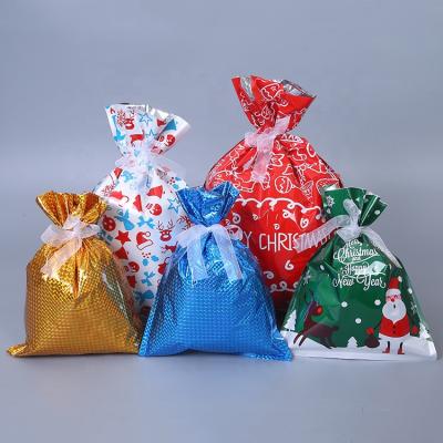 China Tall Colorful And Fashion Santa Drawstring Colorful Christmas Gift Wrapping Bags for sale