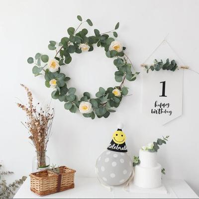 China New Fashion Various Styles Faux Silk Hanging Garland Artificial Floral Eucalyptus Leaves Vine for sale