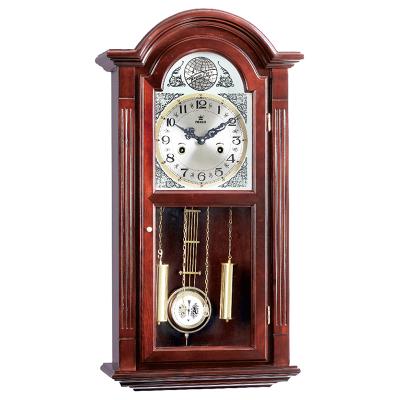 China CE/FCC/ISO Mechanical Rotating Calendars Wall Clocks Wooden Case With Silver Dial And Gold Pendulum for sale