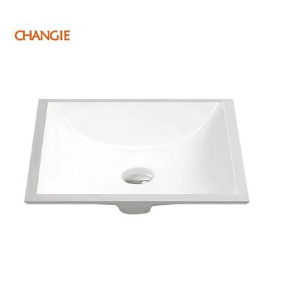 China Wholesale Ceramic Faucet 1633 Undermount Cabinet Sink Oval White Ceramic Changie Hospital Sans Under Counter Sink for sale