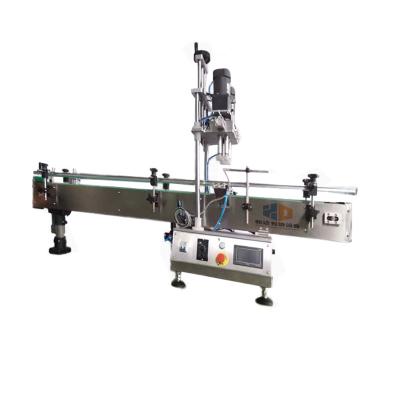 China The food linear bottle capping machine is used for the capping of juice drinks. for sale