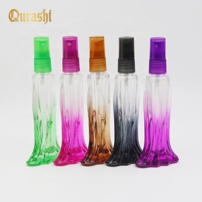 China 15ml Fish Shape Glass Cosmetic Colored Perfume Bottle With Pump Spray for sale