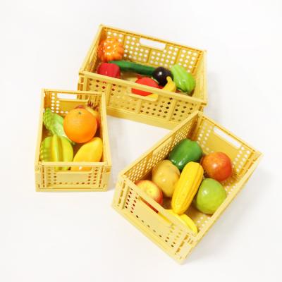 China Folding Plastic Stackable Vegetable Organizer Large Sundries Fruit Storage Heavy Duty Basket For Kitchen for sale