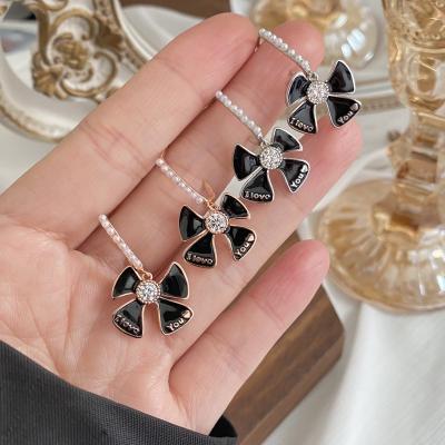 China S925 factory fashion jewelry set 2023 silver retro luster drop light luxury earrings wholesale CLASSIC bow charm female for sale