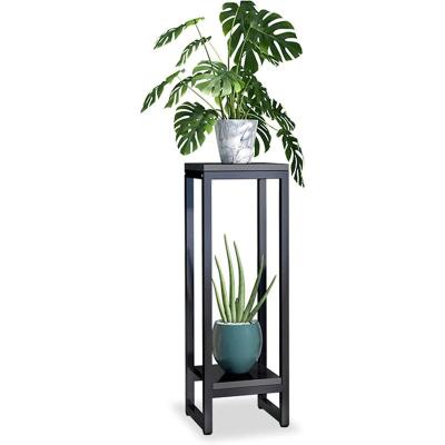 China Bohemian Indoor Black Planter On Stand For Home Garden Decoration Indoor Floor Vase Wedding Decorations Living Room 2022 for sale