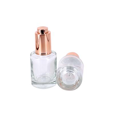 China 30ml Cosmetic Push Button Flat Shoulder Essential Oil Bottle Customize Cosmetic Glass Dropper Bottle for sale