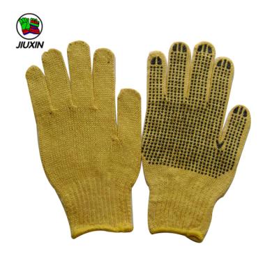 China Yellow String Knitted Seamless Glove Made In Professional Cotton Anti-Slip Factory for sale