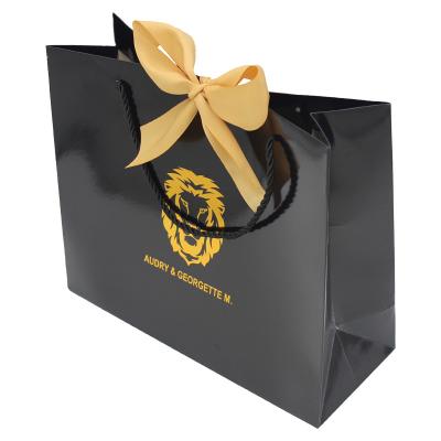 China Custom Recyclable Gold Logo Print Matte Black Rose Carry Paperbags Boutique Shopping Eco Gift Luxury Paper Bags With Handles Ribbon Bow Tie for sale