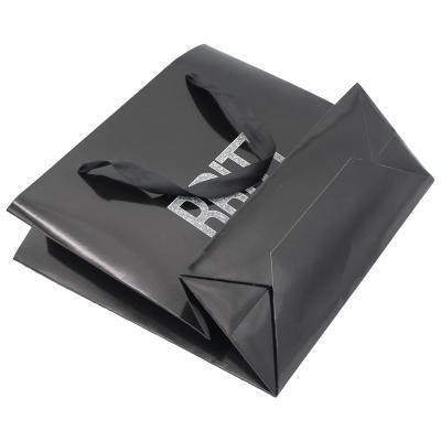 China Recyclable Wholesale Custom Logo Gloss Lamination Black Gift Paper Bag Retail Paper Bags for sale