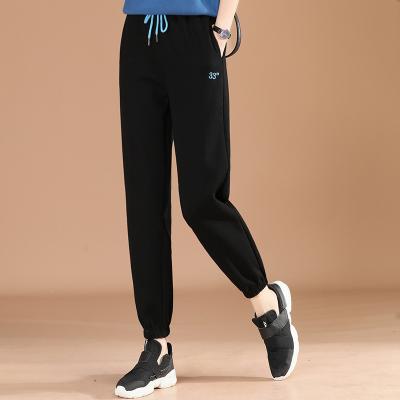 China Hot Selling Embroidered Anti-Wrinkle Waist Black Color Elastic Sweatpants Casual Pants Loose Feet Pants For Women for sale