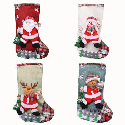 China Christmas Decoration Supplies Wholesale Christmas Socks Gift Bag Decoration Props Fabric Cartoon Design Candy Bag Christmas Canvas Decoration For Kids for sale