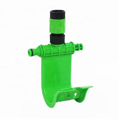 China 2021 Plastic New Luxury Garden Hanging On Tap Plastic Water Hose Holder Hanger With Hose Connector for sale